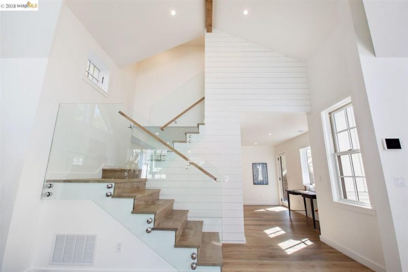 Staircase with plexiglass railing