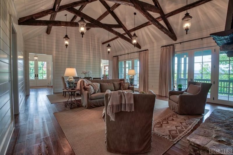 A living room with vaulted beamed ceiling