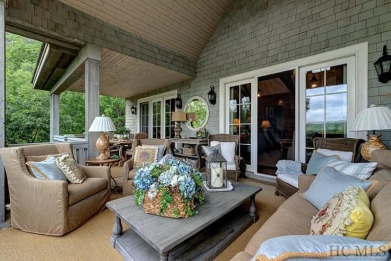 Back porch with sofa and coffee table