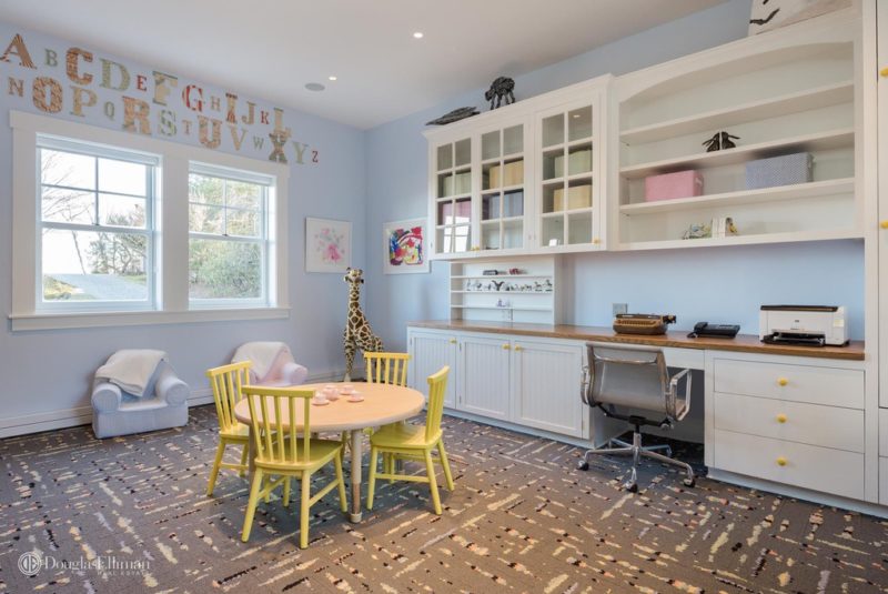 Playroom with small table and yellow chairs