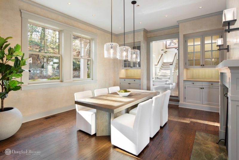 Dining room table and chairs with pendant lights