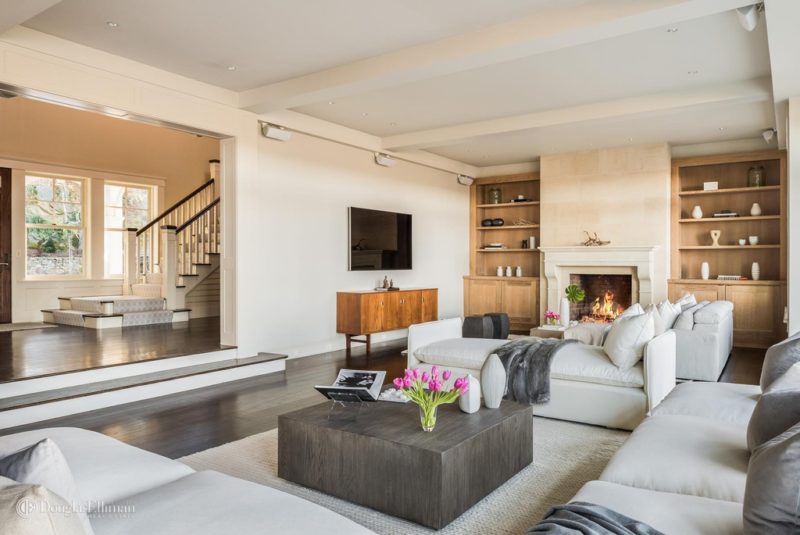 A living room filled with furniture and fireplace