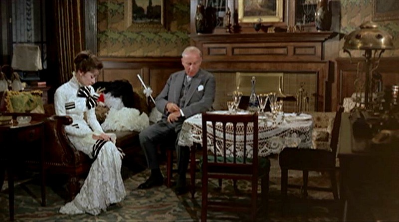 Screenshot of Audrey Hepburn in library