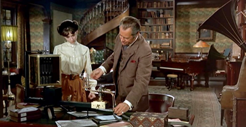 Screenshot of Audrey Hepburn and Rex Harrison in the library of Henry Higgins\' house