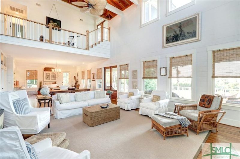 A living room filled with furniture and a fireplace