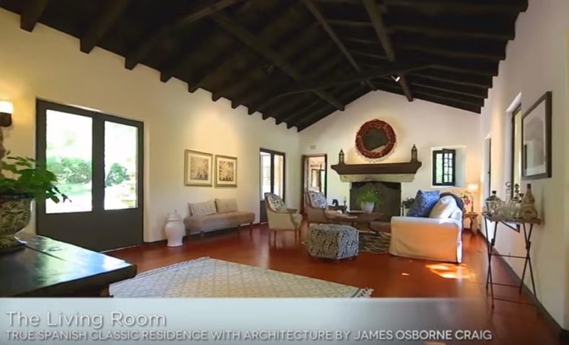 A living room filled with furniture and a fire place