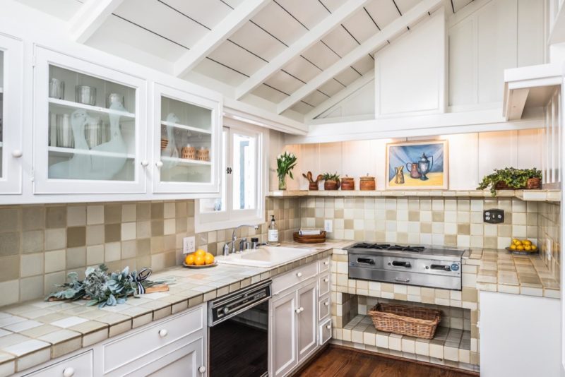 Small cottage kitchen with a sink and a window