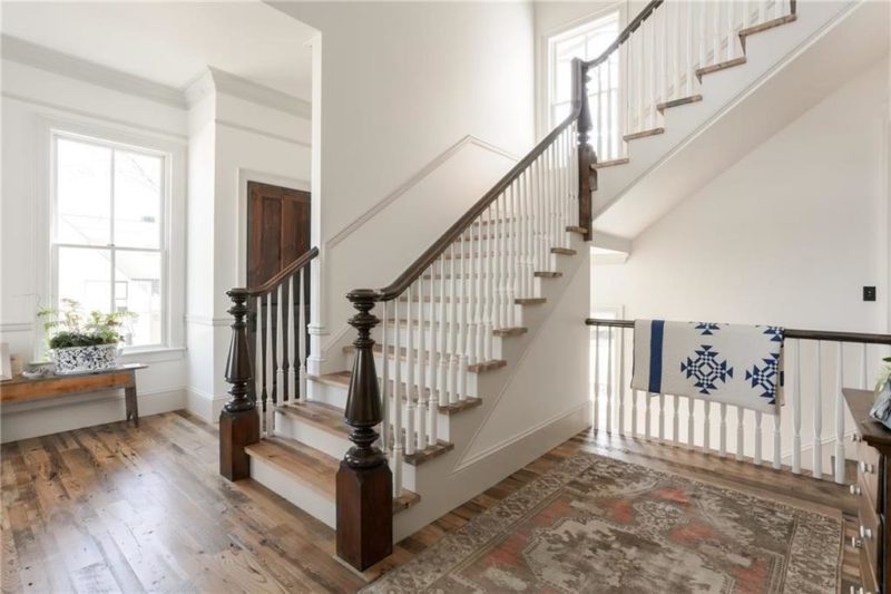 Staircase in remodeled farmhouse