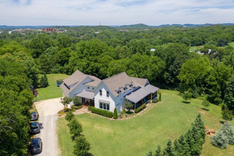 Aerial view of modern farmhouse on 5 acres in Tennessee