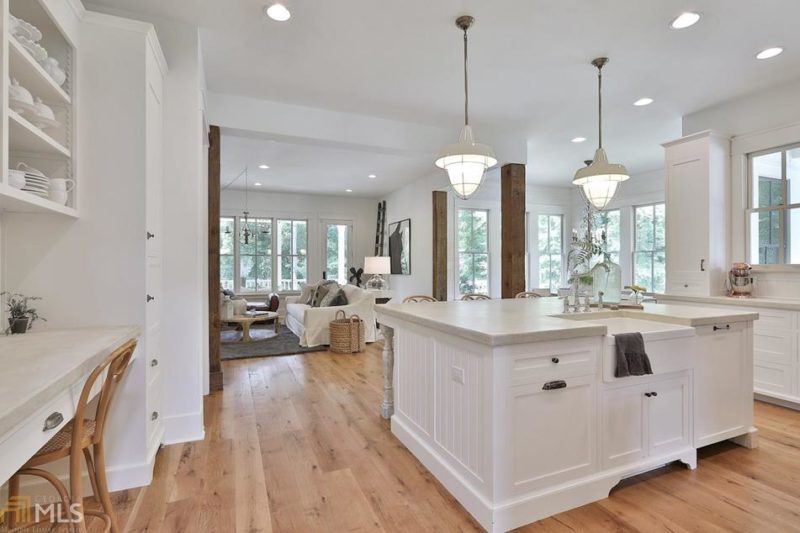 White kitchen with large island