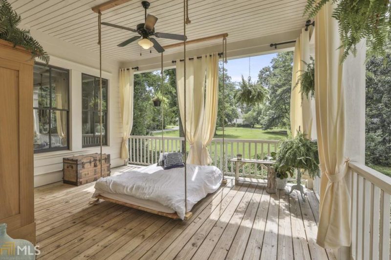 Back porch with swinging bed