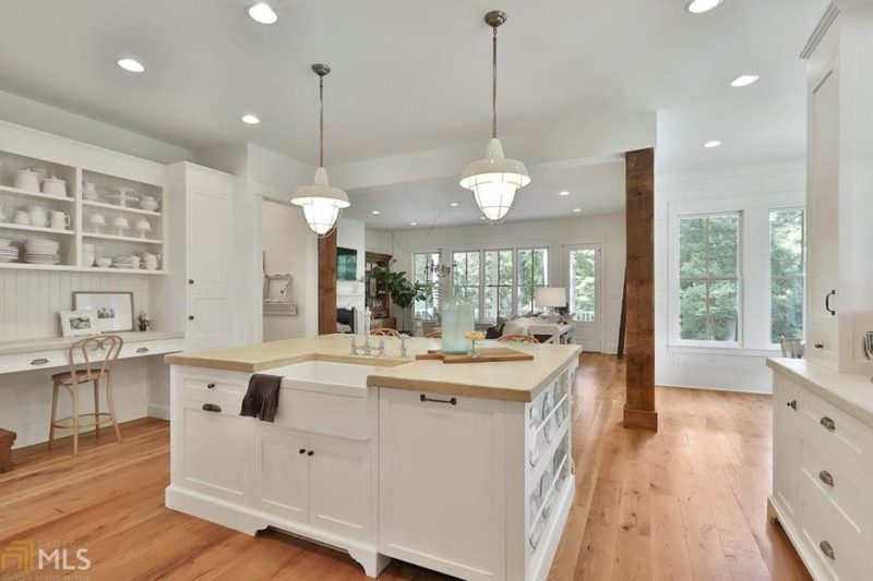 White kitchen with large island