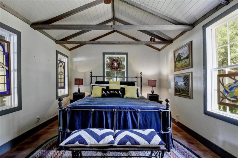 Bedroom with beamed ceilings