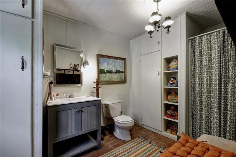 Bathroom with dark blue vanity