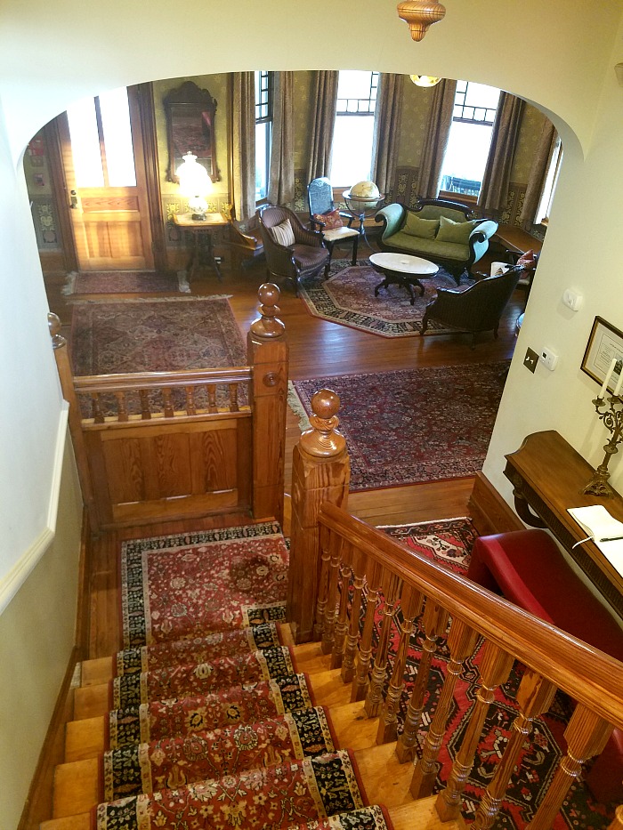 Looking down staircase to the front room of the house