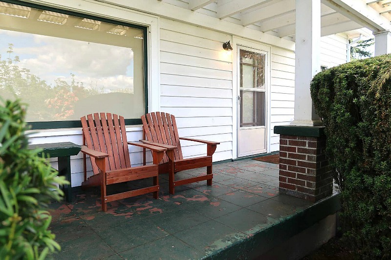 Closeup of back porch and Adirondack chairs