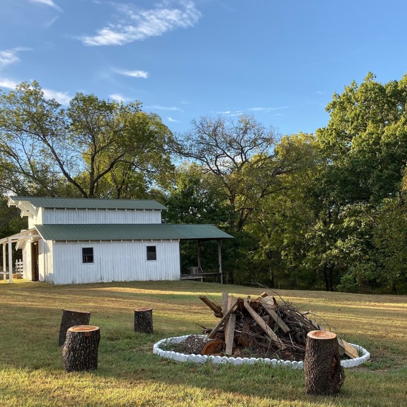 Firepit beside barn