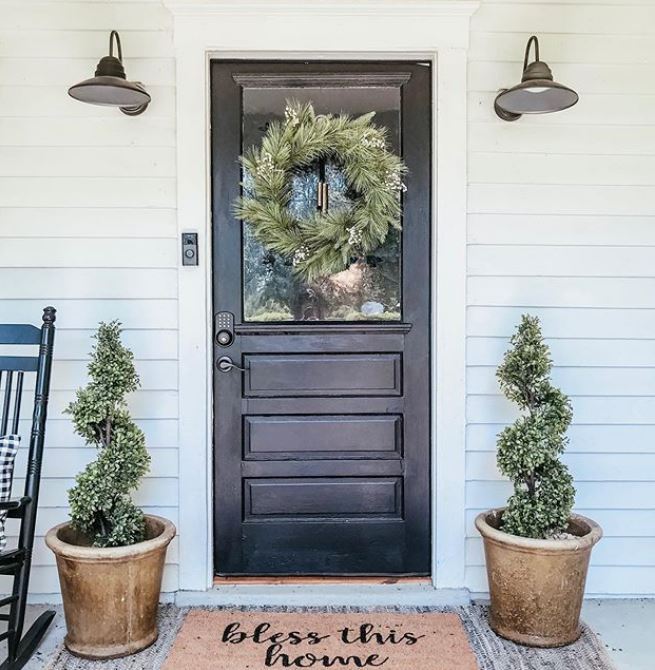 Black door with wreath