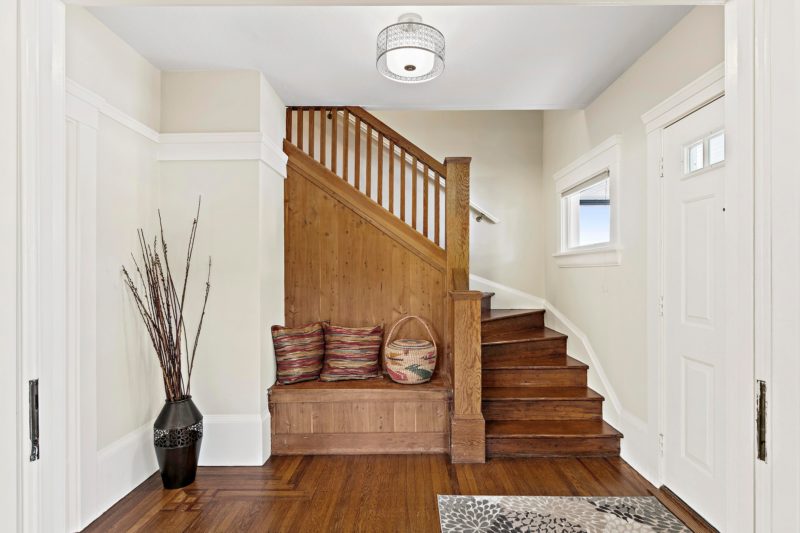 Craftsman Cottage staircase with built-in bench