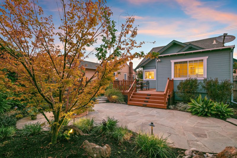 Back exterior of cottage with deck