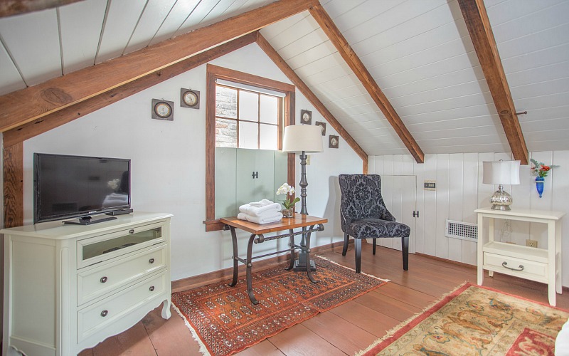 Table and chair in front of window