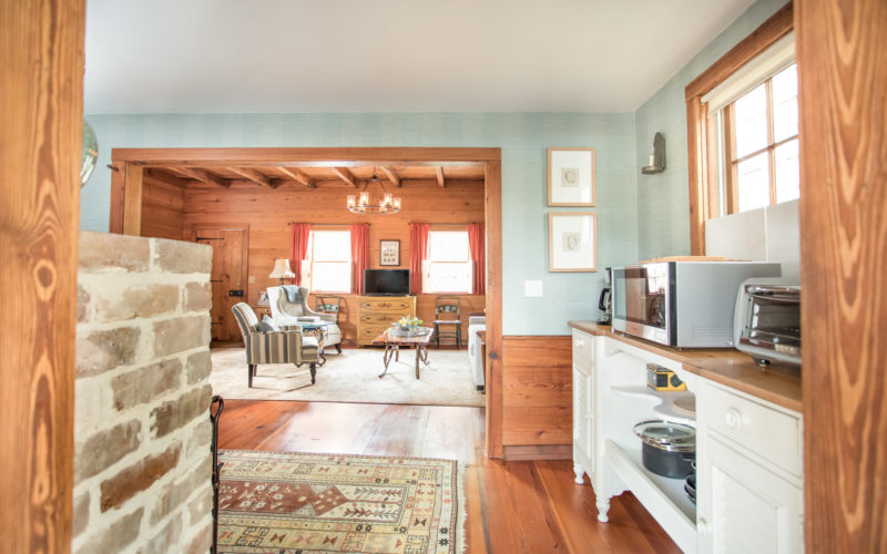 Cottage kitchen looking into living room