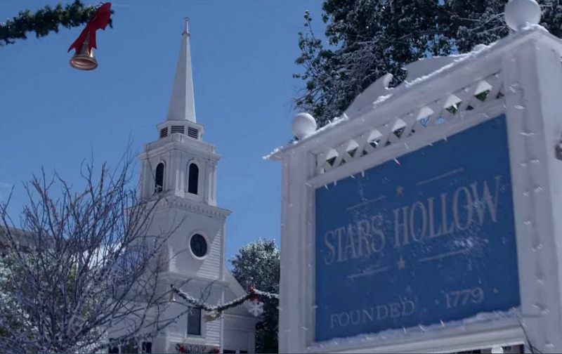 Stars Hollow town sign and church in snow