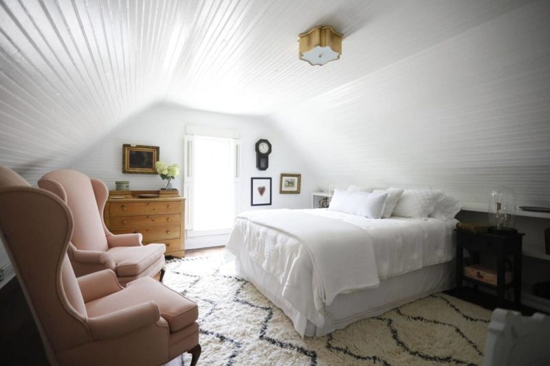 Upstairs bedroom with slanted ceilings