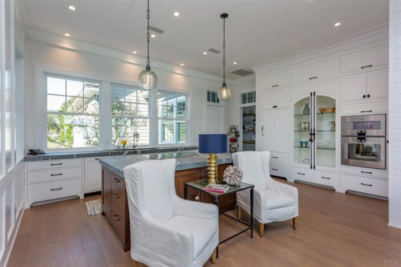 Beach house kitchen with armchairs