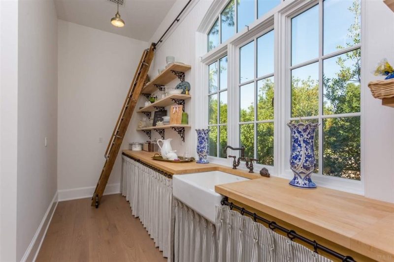 Kitchen pantry with library ladder