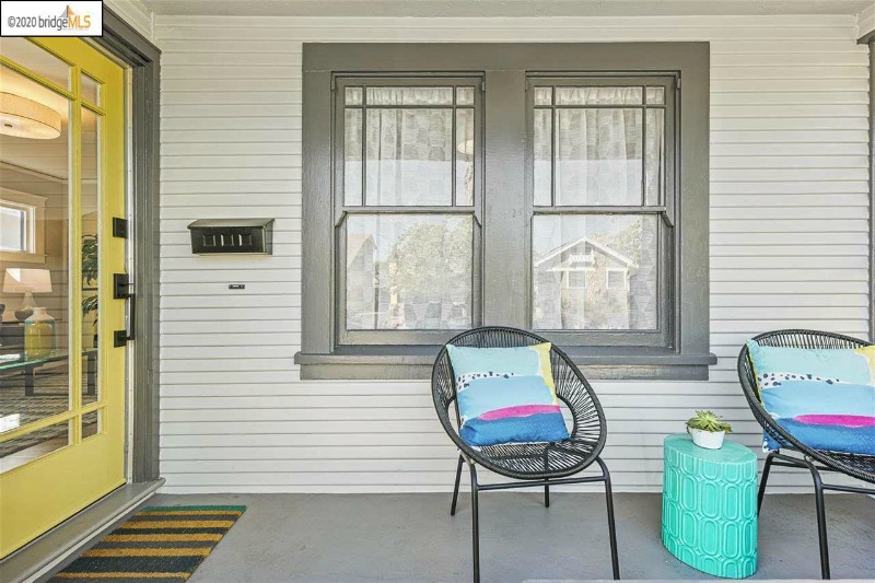 Bungalow Porch with Yellow Front Door