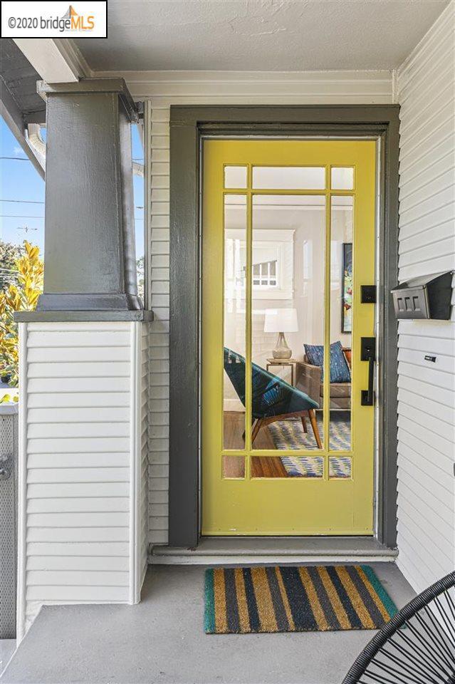 Yellow front door on Bungalow