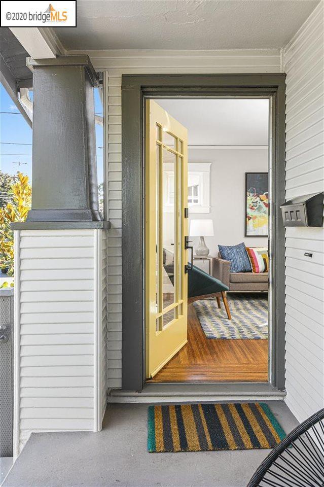 Yellow front door on Bungalow