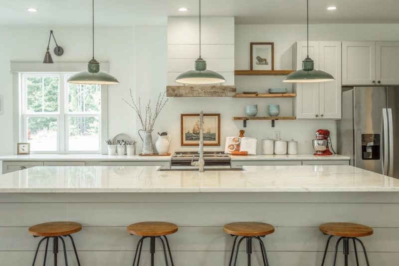 Kitchen island with barstools in farmhouse