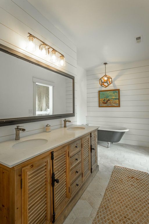 bathroom with freestanding tub