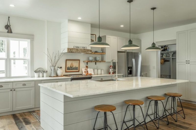 kitchen in modern farmhouse with marble island