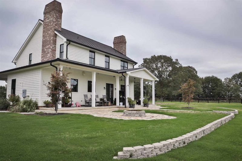 back of farmhouse with porch