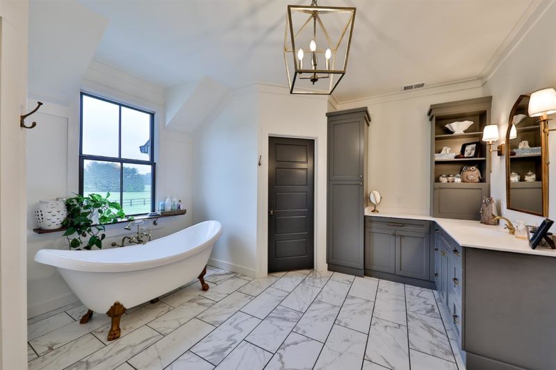 Farmhouse bathroom with freestanding tub