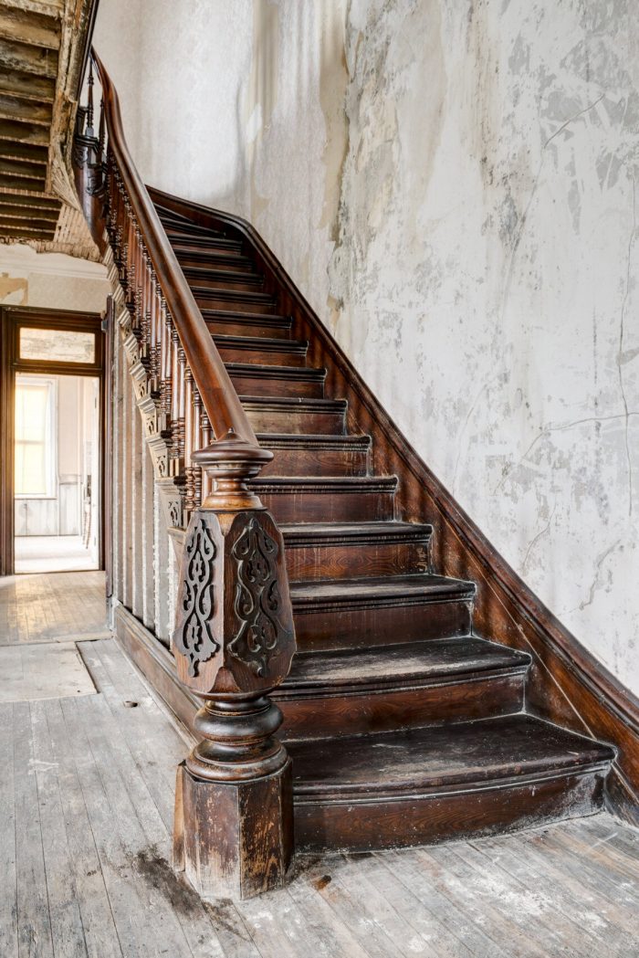 grand staircase inside haunted castle