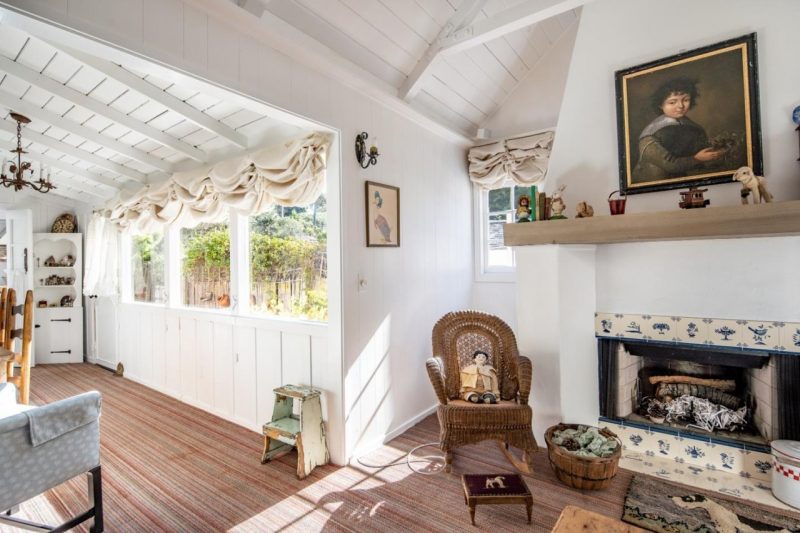 family room with fireplace in cottage