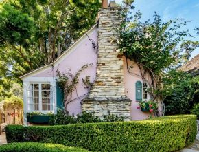 Pink Exterior of Hugh Comstock Cottage For Sale in Carmel-by-the-Sea