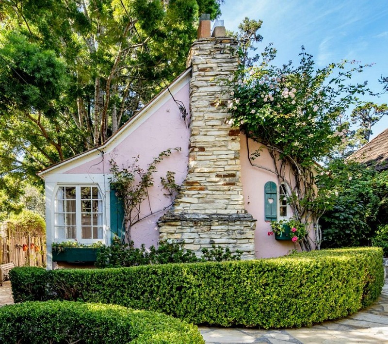 Pink Exterior of Hugh Comstock Cottage For Sale in Carmel-by-the-Sea