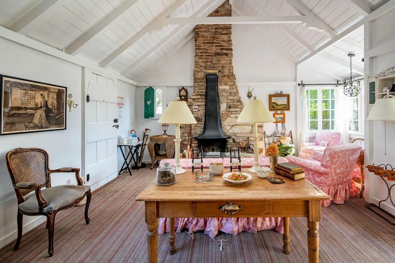 Hugh Comstock Cottage living room with fireplace