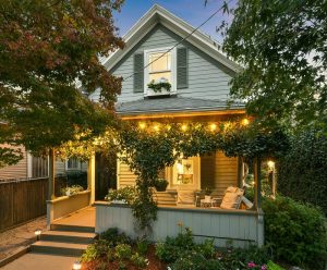 Small Ivy-Covered Farmhouse with front porch