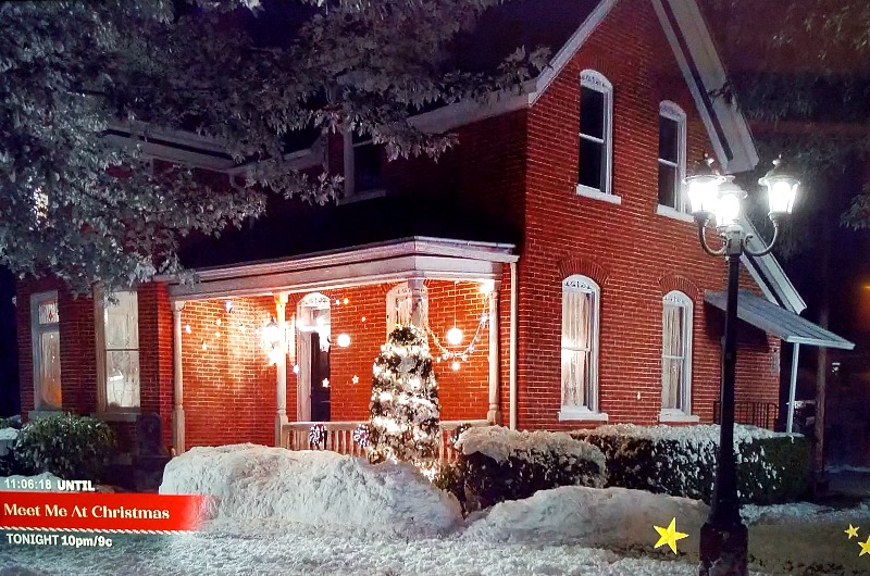 old house in Holly & Ivy movie at night in snow