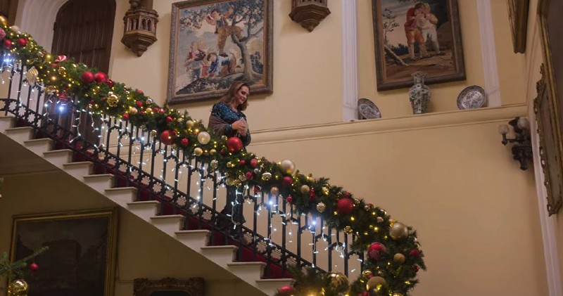 grand staircase decorated for Christmas