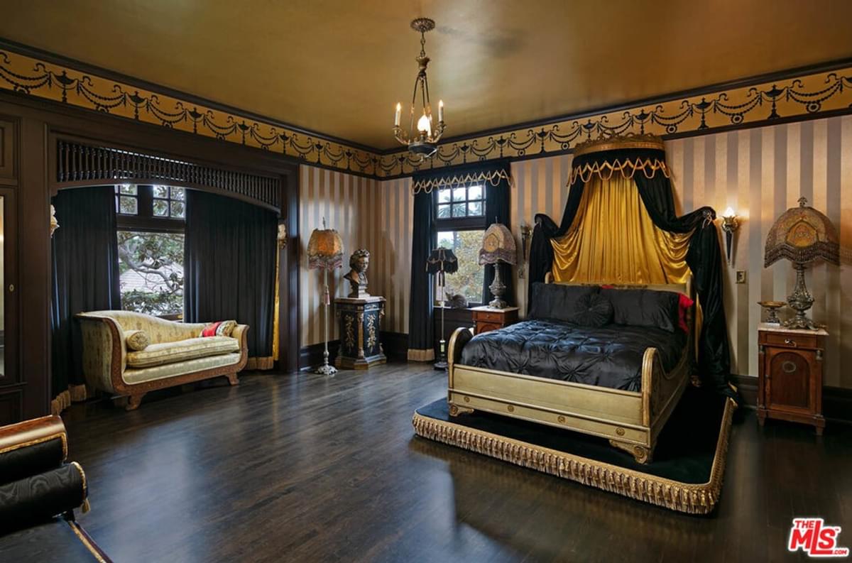 Kat Von D's bedroom in real estate listing with gold painted ceiling