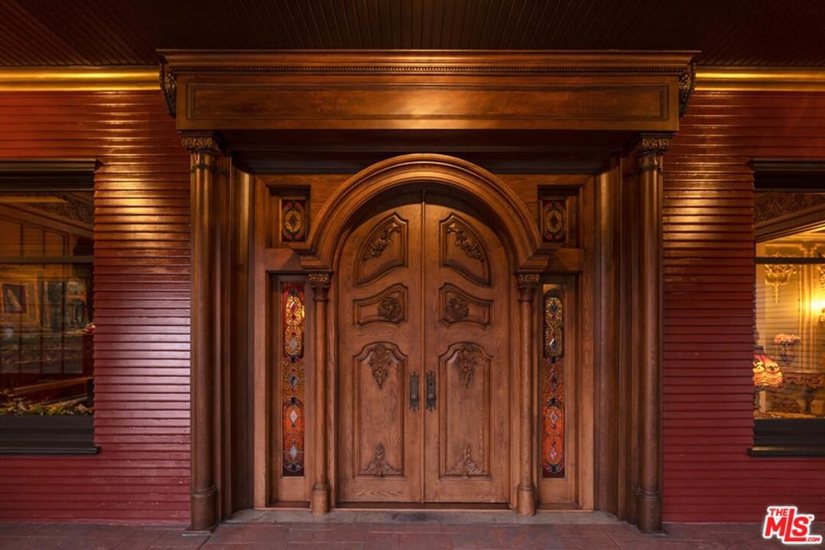 closeup of ornate wood entry door