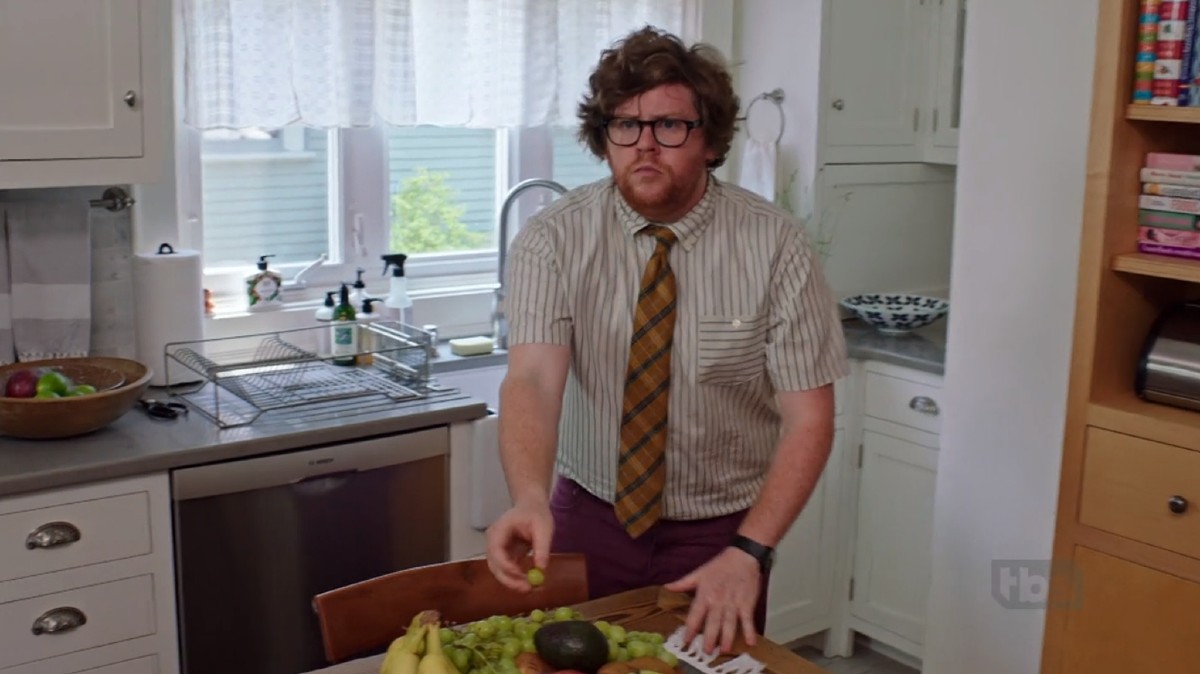 Zack Pearlman eating a grape in The Intern
