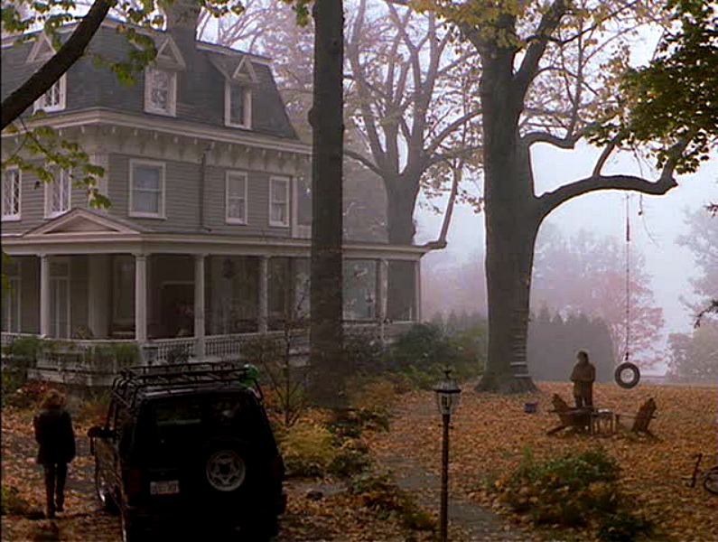 exterior of house in fog in autumn
